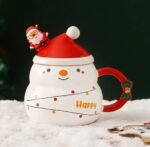 CHRISTMAS MUG WITH SANTA HAT LID AND SPOON IN A GIFT BOX - Image 2